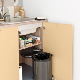Mueble bajo con papelera integrada