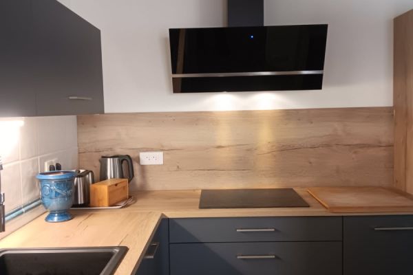 La cuisine grise et bois de Mr G., une cuisine réalisée par SoCoo'c Cahors