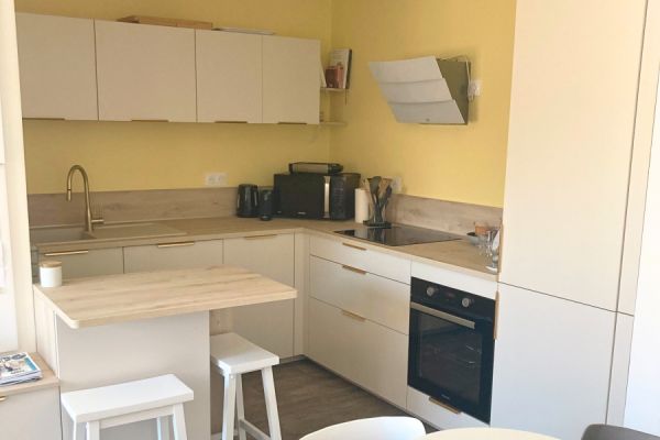 Cuisine équipée en L + ilôt , une cuisine réalisée par SoCoo'c Bordeaux le Lac