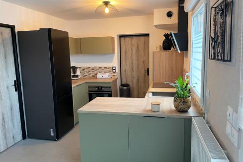 Cuisine bois et vert provence, une cuisine réalisée par SoCoo'c Douai