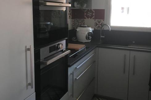 Cuisine en u avec intégration d&#039;une cave à vin, une cuisine réalisée par SoCoo'c Chalon sur Saône